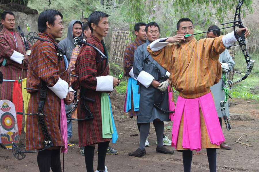 Watch an archery tournament in Bhutan