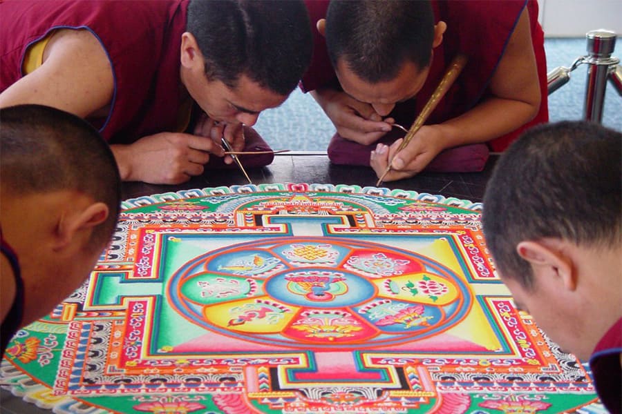 make sand mandalas with monk in bhutan tours