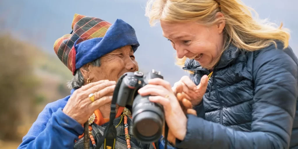 take photos with bhutanese woman in bhutan tours